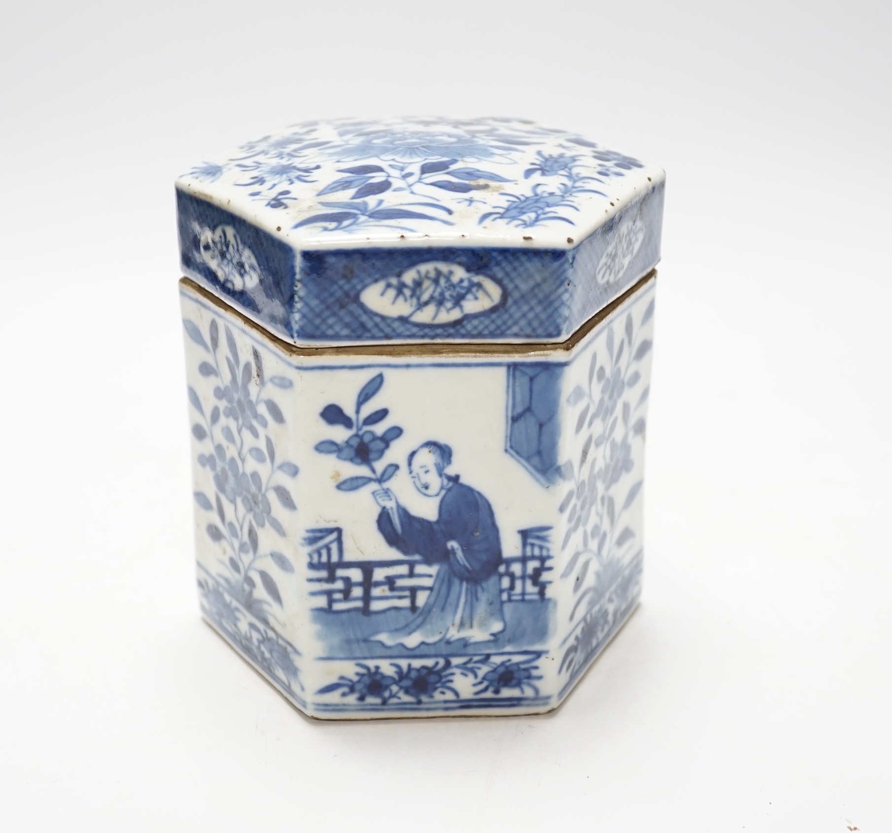 A late 19th century Chinese blue and white hexagonal jar and cover, 14cm